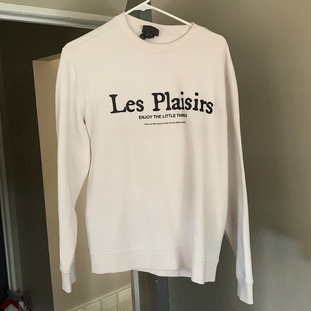 White sweater with black letters